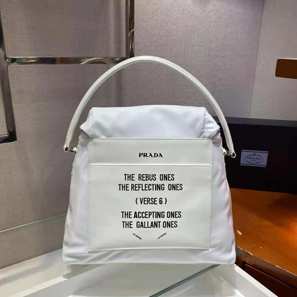 Prada Signaux Nylon and Leather Hobo Bag for Women in White Prada Signaux Nylon and Leather Hobo Bag for Women in White