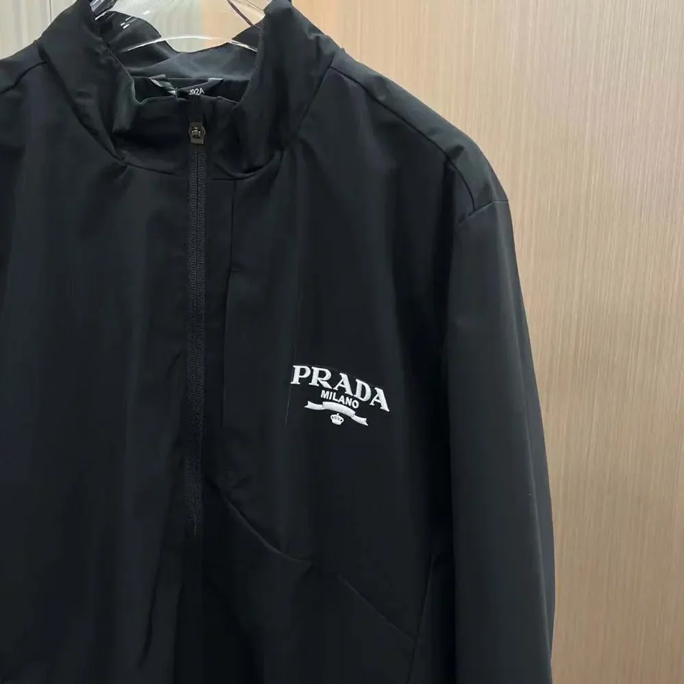 Prada Re-Nylon Blouson Jacket with Triangle Logo for Women in Black
