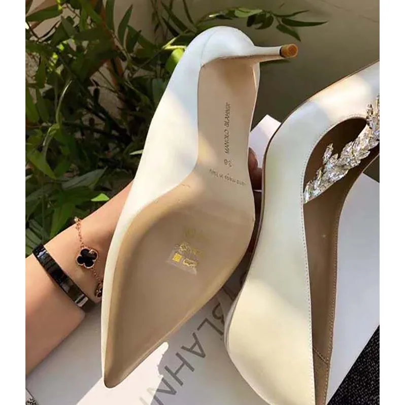 Manolo Blahnik Shoes Nadira Satin Jewel Buckle Pumps 90mm Heel for Women in White Manolo Blahnik Shoes Nadira Satin Jewel Buckle Pumps 90mm Heel for Women in White
