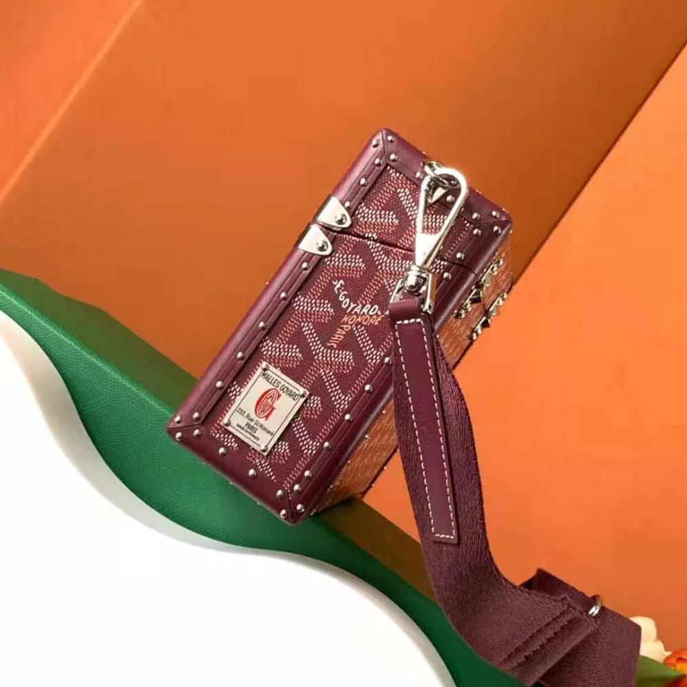Goyard Cassette Trunk Bag in Goyardine Canvas & Clamecy Cowhide for Women in Maroon