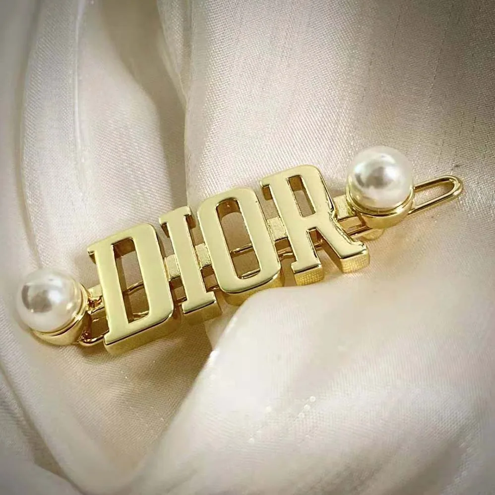 Dior Dio(r)evolution Barrette Gold-Finish Metal and White Resin Pearls for Women Dior Dio(r)evolution Barrette Gold-Finish Metal and White Resin Pearls for Women