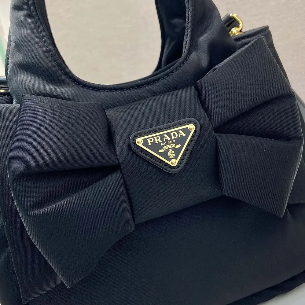Prada Padded Re-Nylon Mini for Women in bag with Bow