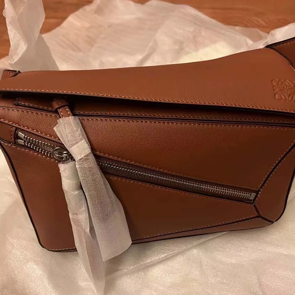 Loewe Small Puzzle Bumbag in Classic Calfskin for Unisex in Brown