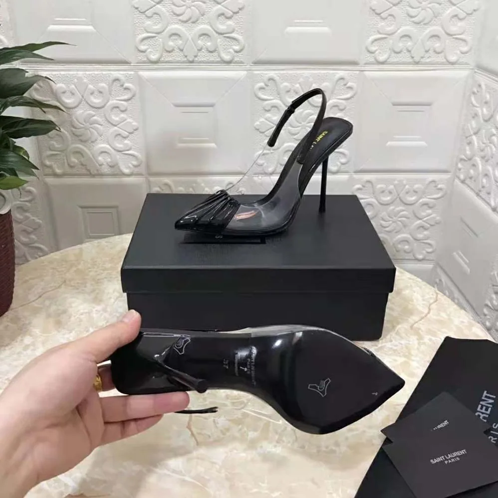 Saint Laurent YSL Chica Slingback Pumps in Tpu and Patent Leather for Women in Black Saint Laurent YSL Chica Slingback Pumps in Tpu and Patent Leather for Women in Black