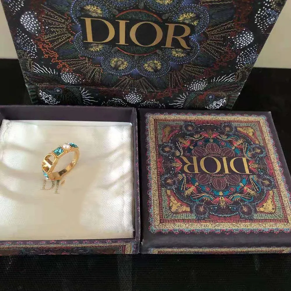 Dior Petit CD Ring Gold-Finish Metal with White Resin Pearls and Light Blue Crystals for Women Dior Petit CD Ring Gold-Finish Metal with White Resin Pearls and Light Blue Crystals for Women