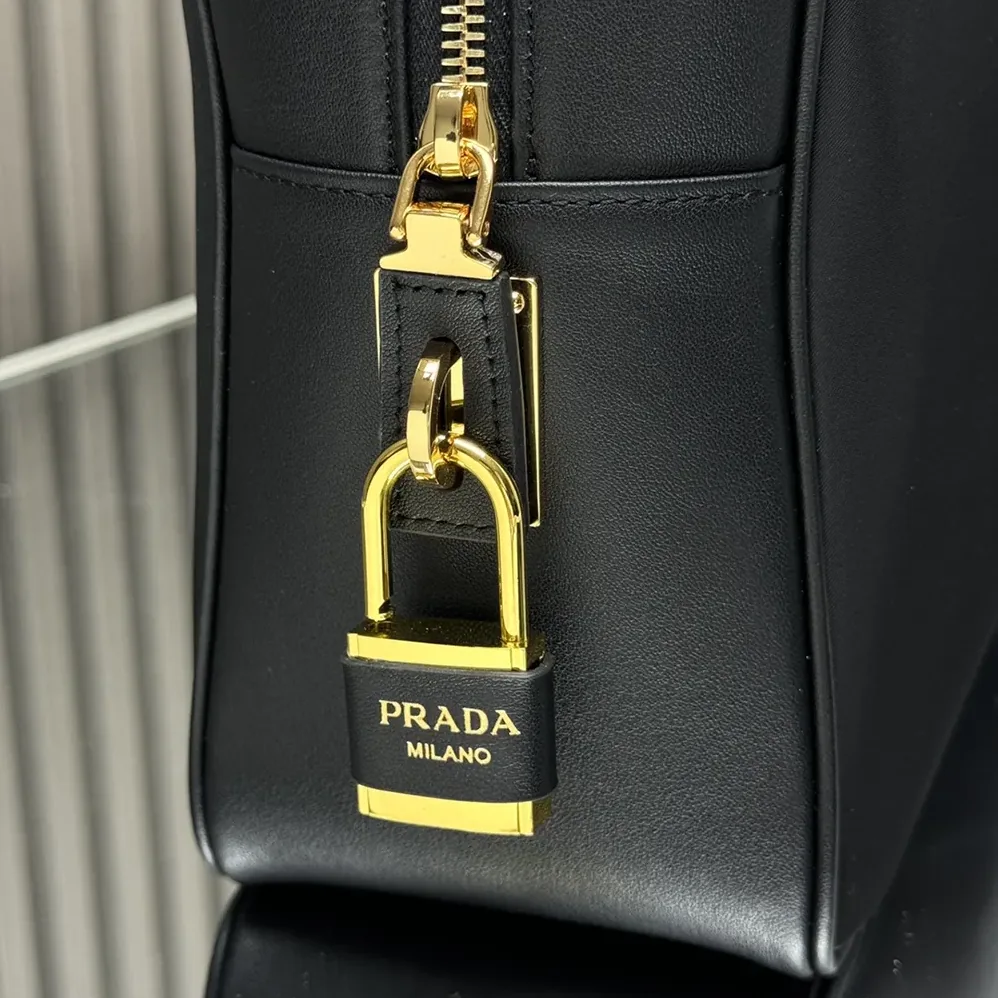 Prada Large Re-Nylon and Leather Top for Women in handle Bag with Padlock Prada Large Re-Nylon and Leather Top for Women in handle Bag with Padlock