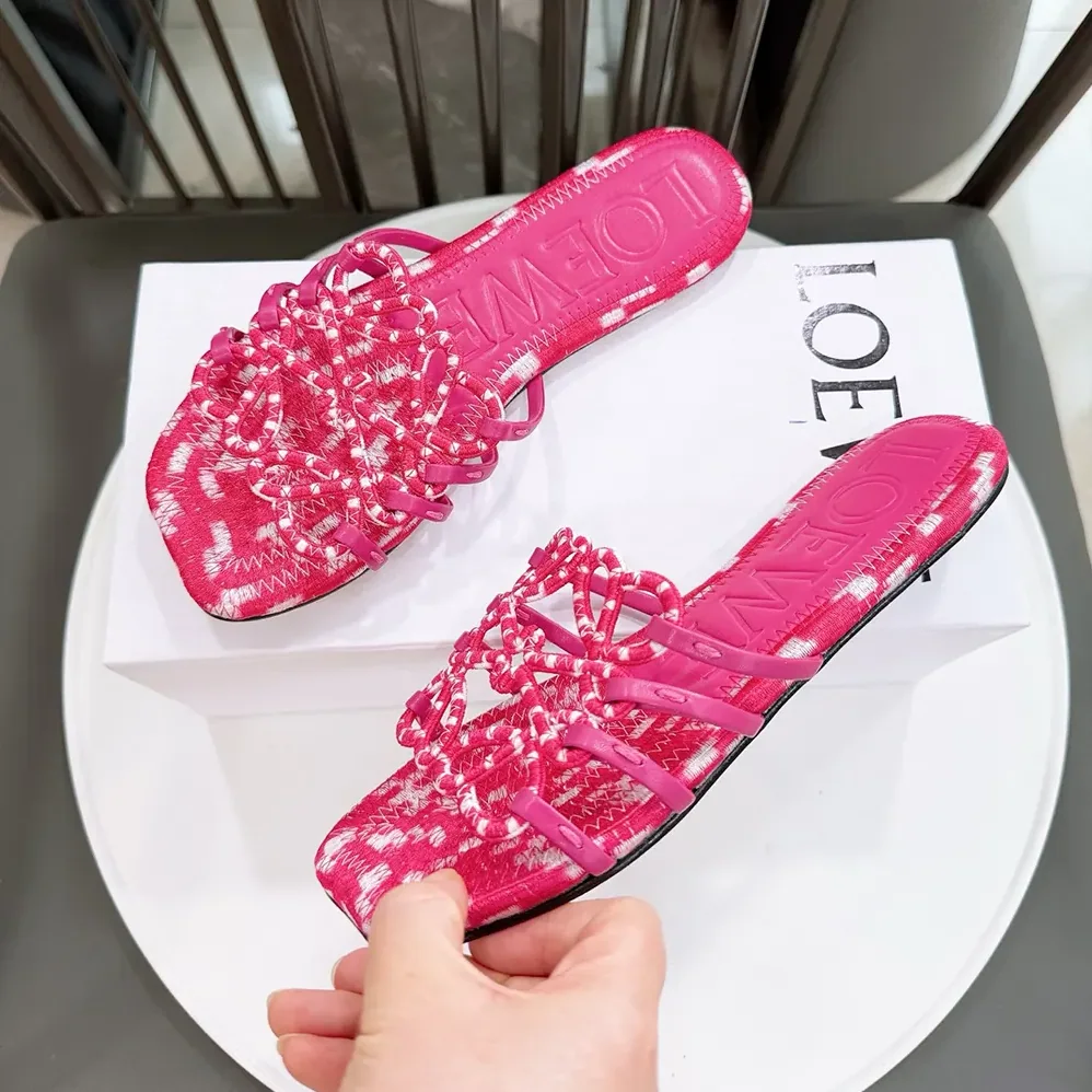 Loewe Petal Anagram Slide in Embroidered Canvas for Women in Orchid Loewe Petal Anagram Slide in Embroidered Canvas for Women in Orchid