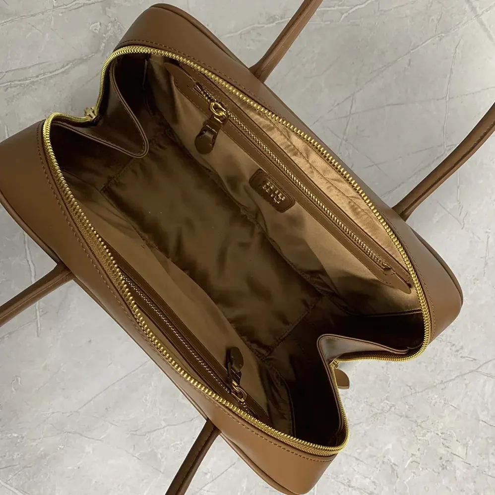 Miu Miu Beau Leather Top-handle Bag for Women in Brown