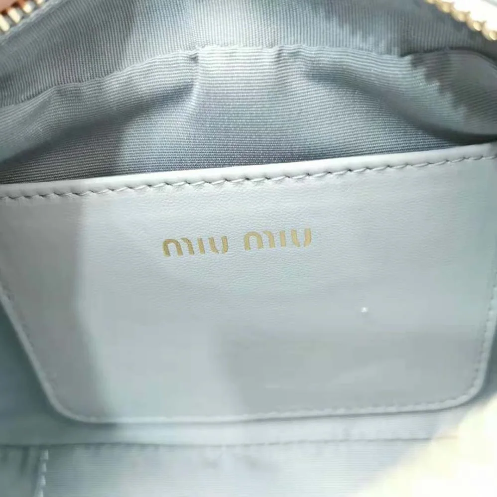 Miu Miu Matelassé Nappa Leather Top-Handle Mini-Bag for Women in Silver