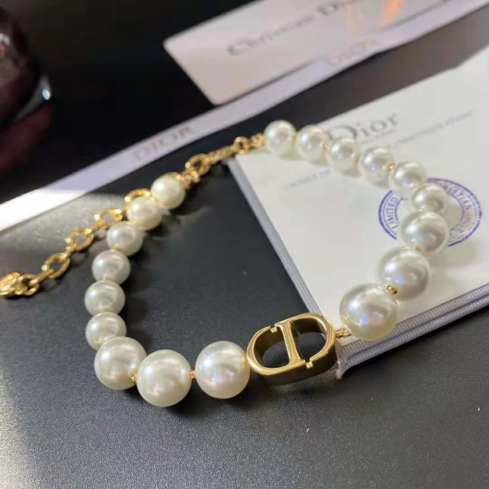 Dior 30 Montaigne Bracelet Gold-Finish Metal and White Resin Pearls for Women Dior 30 Montaigne Bracelet Gold-Finish Metal and White Resin Pearls for Women