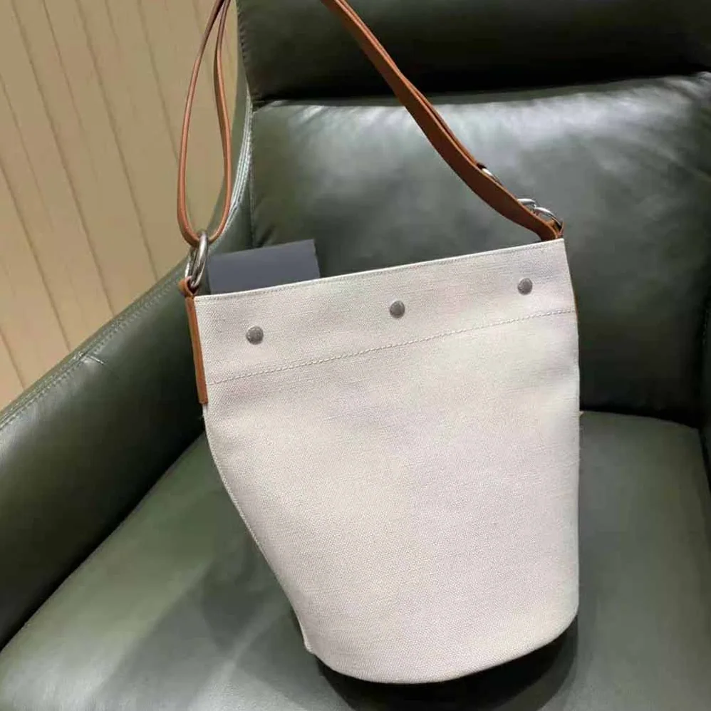 Saint Laurent YSL Rive Gauche Bucket Bag in Linen for Women in Brown