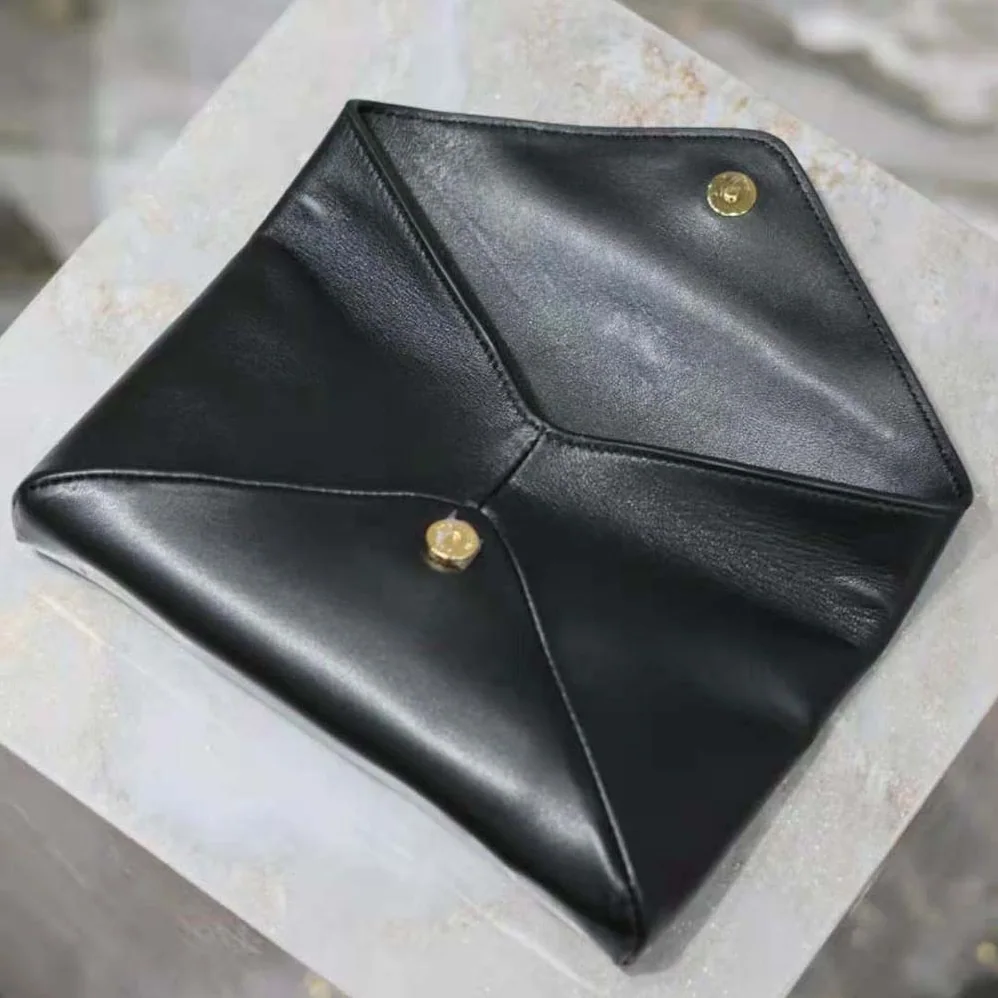 Saint Laurent YSL Cassandre Small Envelope Pouch in Lambskin for Women in Black Saint Laurent YSL Cassandre Small Envelope Pouch in Lambskin for Women in Black