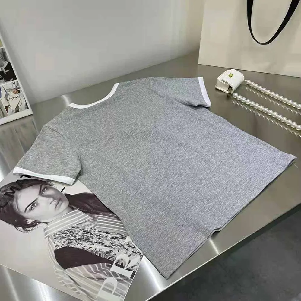 Celine Embroidered Celine 16 T-shirt in Cotton Jersey for Women in Silver Celine Embroidered Celine 16 T-shirt in Cotton Jersey for Women in Silver