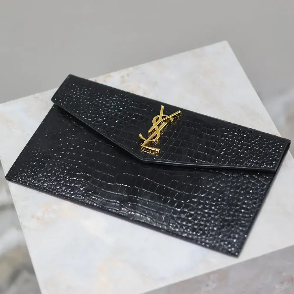 Saint Laurent YSL Uptown Pouch in Crocodile-embossed Shiny Leather for Women in Black