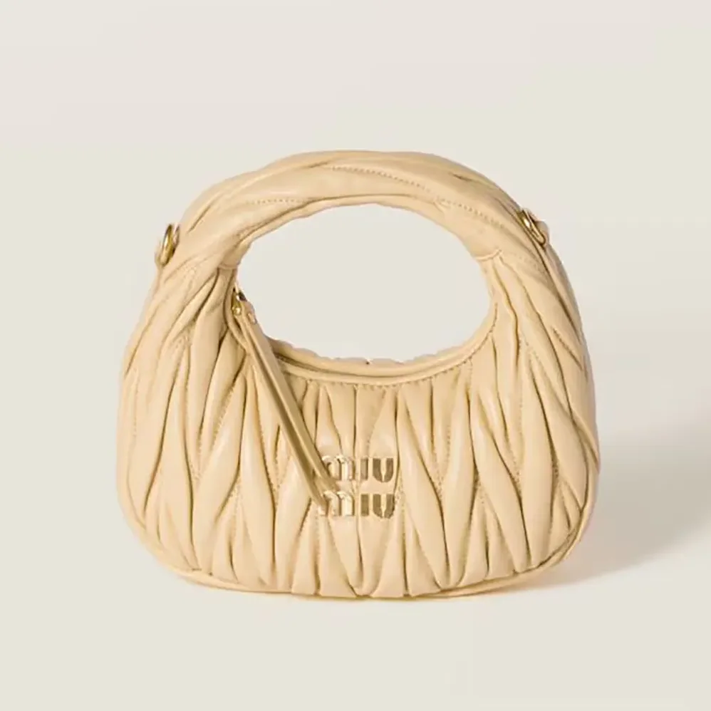 Miu Miu Wander Matelassé Nappa Leather Hobo Mini-Bag for Women in Light Yellow Miu Miu Wander Matelassé Nappa Leather Hobo Mini-Bag for Women in Light Yellow