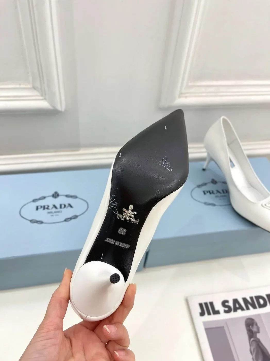 Prada Spike Pumps White