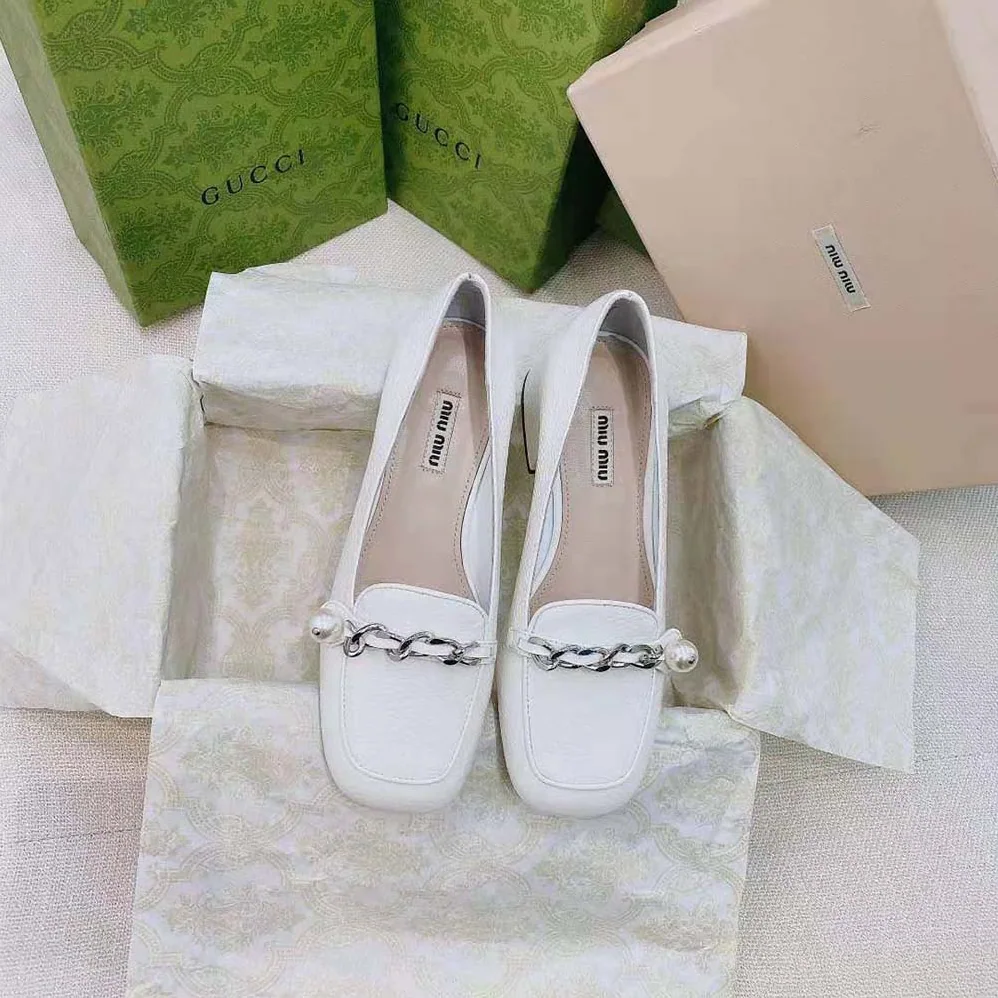 Miu Miu Patent Leather Loafers in 35mm Heel for Women in White Miu Miu Patent Leather Loafers in 35mm Heel for Women in White