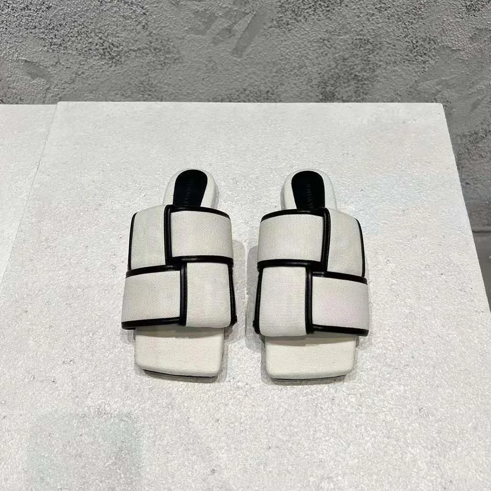 Bottega Veneta Patch Flat Mule Padded Intreccio Canvas and Leather Flat Mules for Women Bottega Veneta Patch Flat Mule Padded Intreccio Canvas and Leather Flat Mules for Women