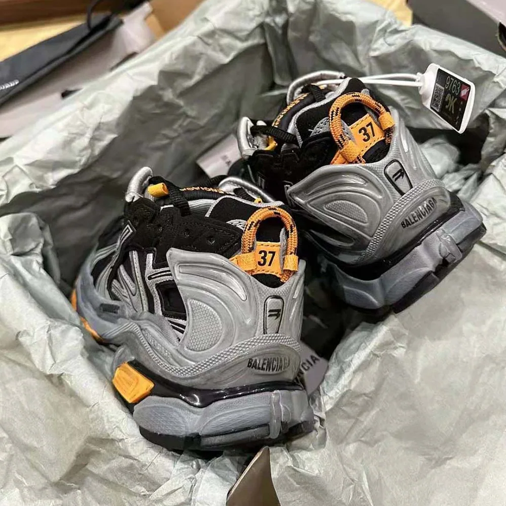 Balenciaga Runner Sneaker in Black/Grey/Neon Orange Nylon and Suede for Unisex in like Fabric Balenciaga Runner Sneaker in Black/Grey/Neon Orange Nylon and Suede for Unisex in like Fabric