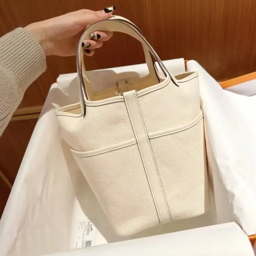 Hermes Picotin Lock 18 Pockets in Goeran Canvas Leather for Women in White Hermes Picotin Lock 18 Pockets in Goeran Canvas Leather for Women in White