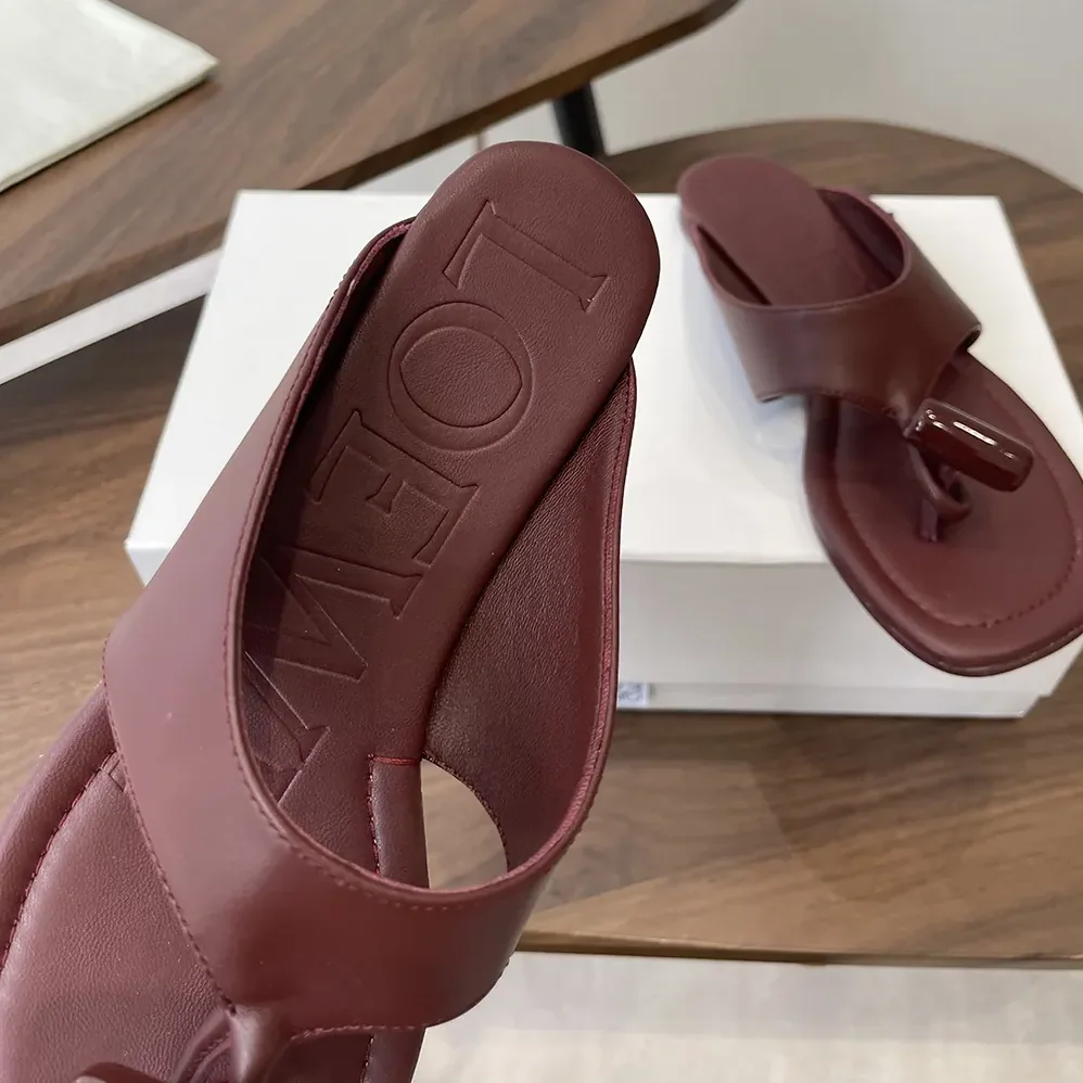 Loewe Toggle Flat Sandal in Shiny Smoot Calfskin for Women in Burnt Red Loewe Toggle Flat Sandal in Shiny Smoot Calfskin for Women in Burnt Red