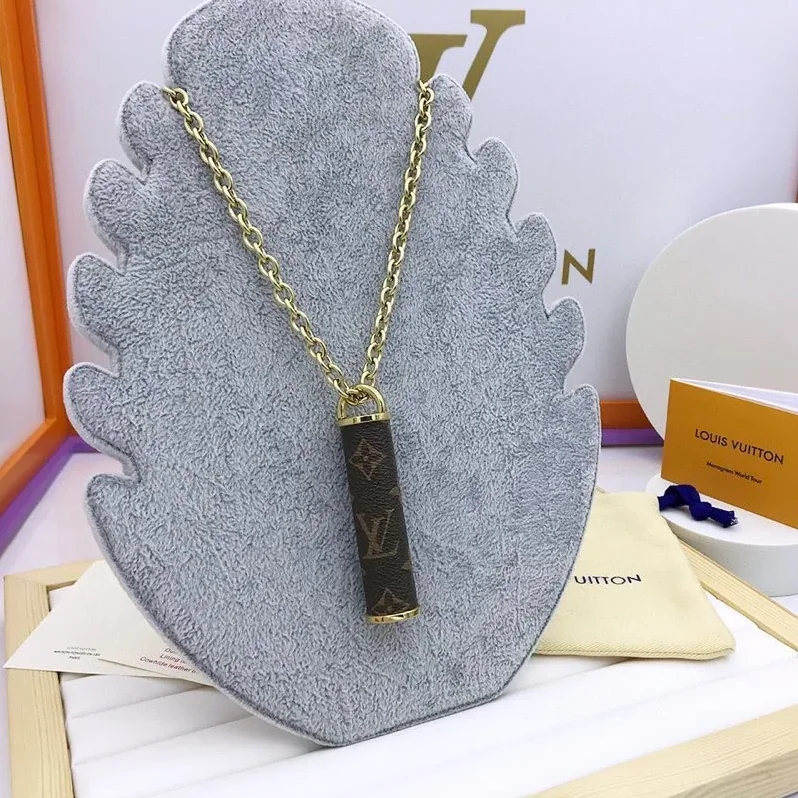 Louis Vuitton Cylinder Pendant Necklace Gold Tone Louis Vuitton Cylinder Pendant Necklace Gold Tone