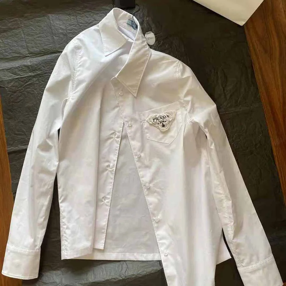 Prada Poplin Shirt Reveals a Complex Simplicity Constantly for Women Prada Poplin Shirt Reveals a Complex Simplicity Constantly for Women