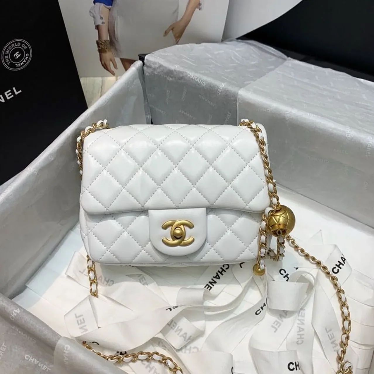 Chanel Flap Bag With CC Ball On Strap Mini Crossbody in White Gold Hardware Chanel Flap Bag With CC Ball On Strap Mini Crossbody in White Gold Hardware