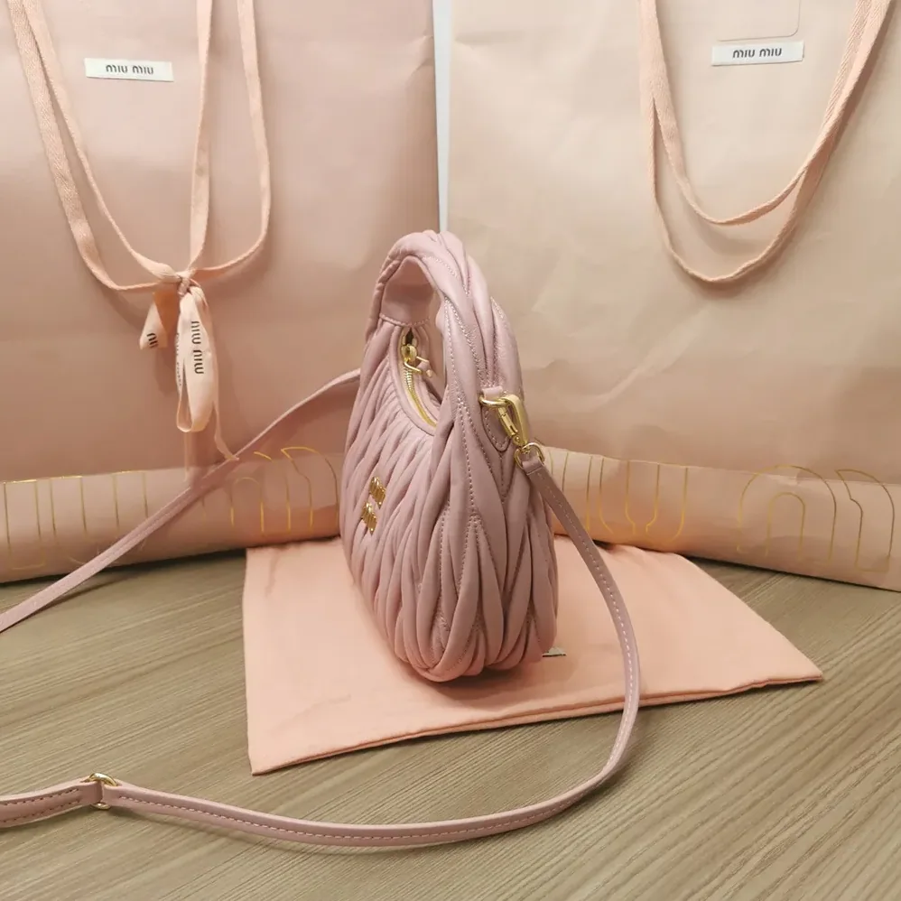 Miu Miu Wander Matelassé Nappa Leather Hobo Bag for Women in Alabaster Pink Miu Miu Wander Matelassé Nappa Leather Hobo Bag for Women in Alabaster Pink
