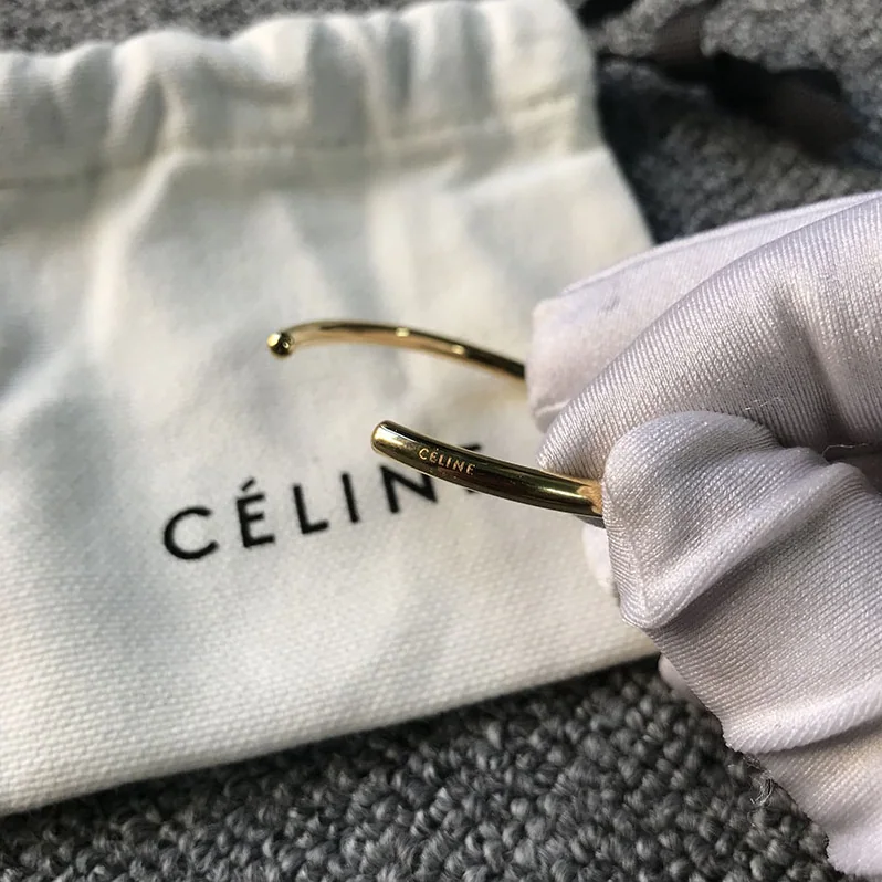 Celine Knot Extra-Thin Bracelet in Brass with Rhodium Finish for Women in Gold