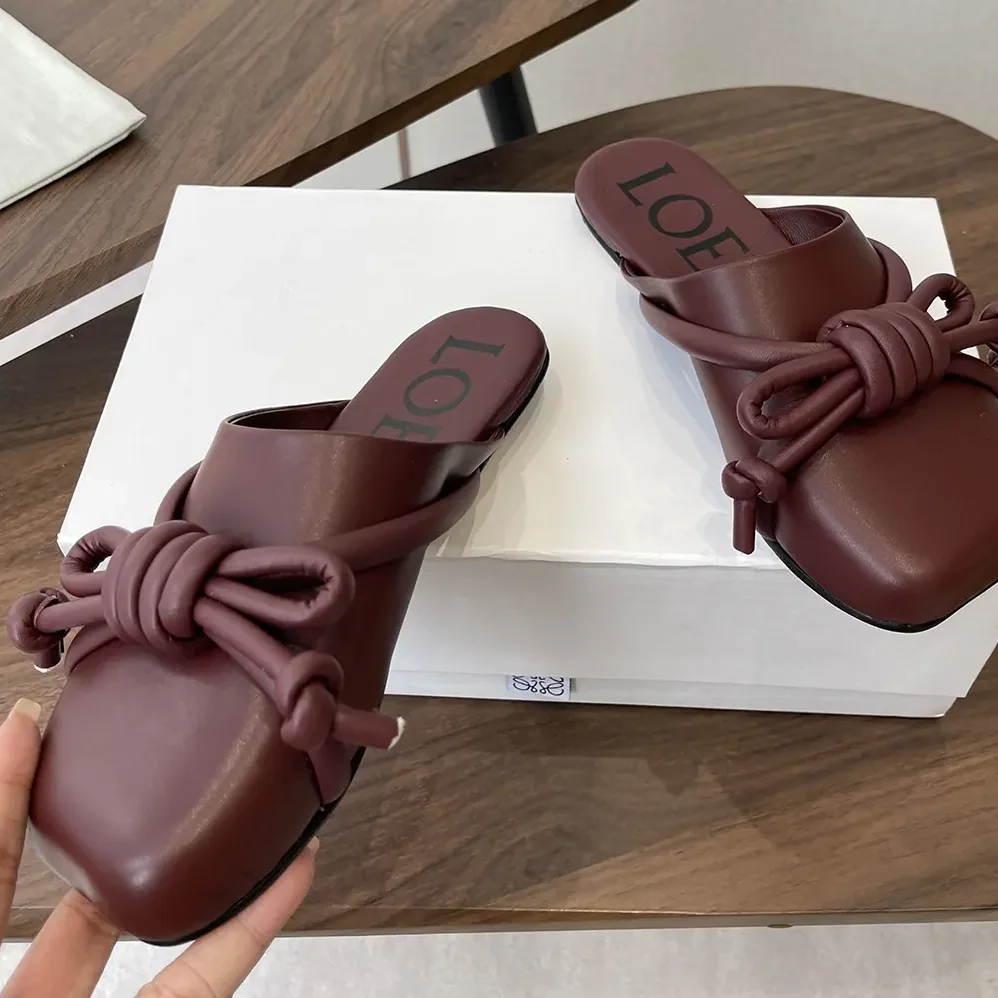 Loewe Flamenco Knot Mule in Lambskin for Women in Dark Chestnut Loewe Flamenco Knot Mule in Lambskin for Women in Dark Chestnut