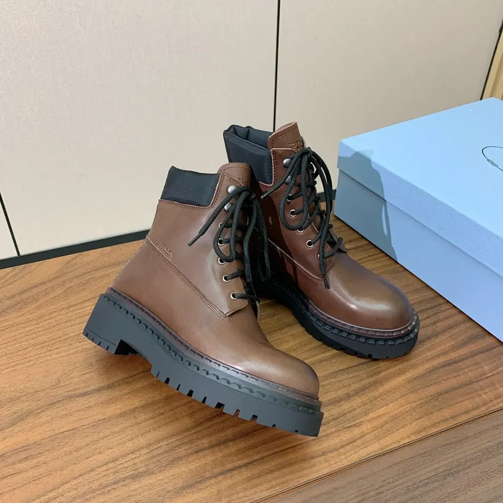 Prada Leather and Re-Nylon booties for Unisex in Cognac