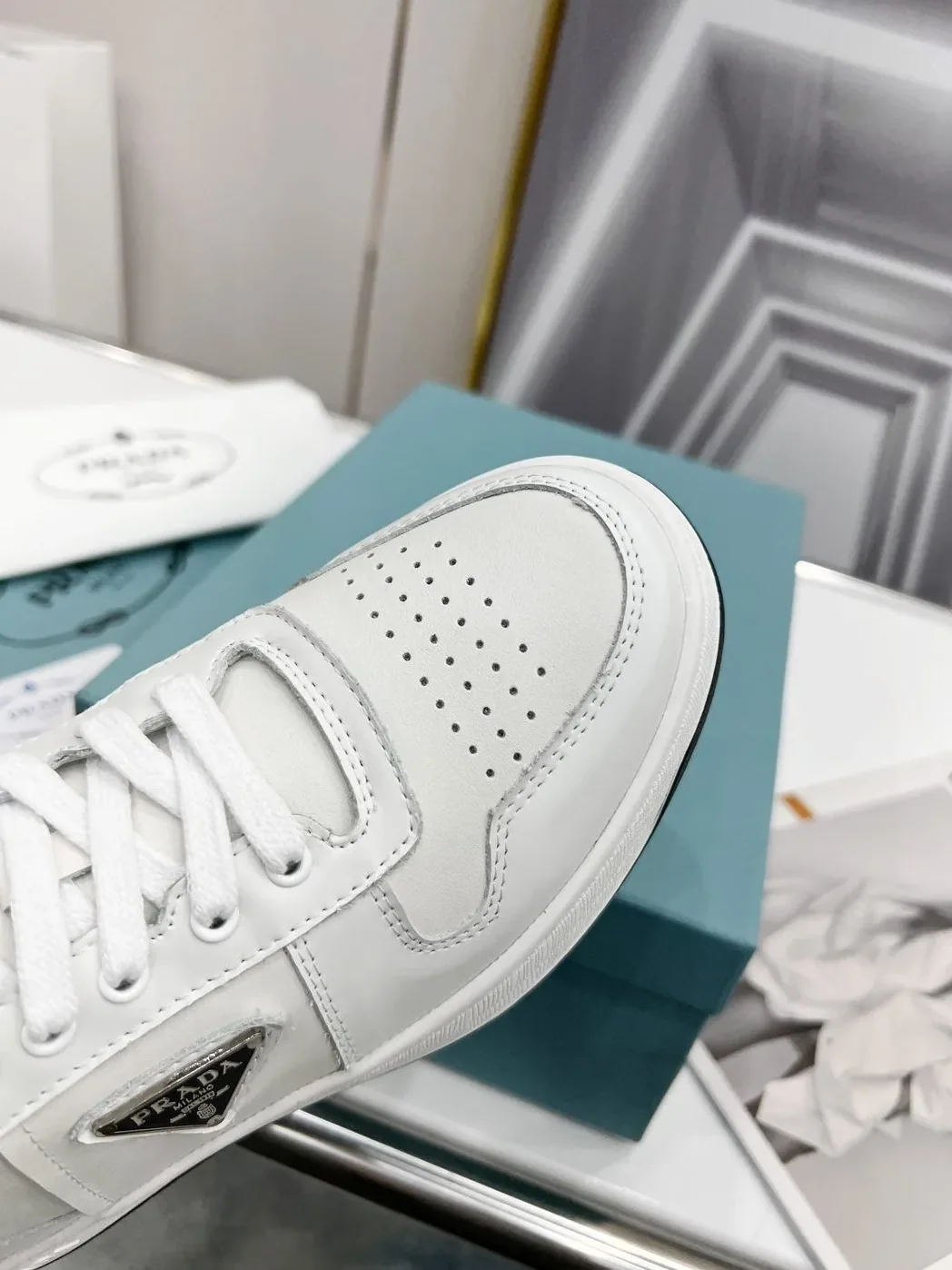 Prada Downtown Perforated Sneakers White in Black /
