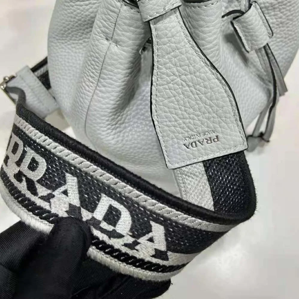 Prada Leather Bucket Bag with A Soft Silhouette for Women in Blue Prada Leather Bucket Bag with A Soft Silhouette for Women in Blue