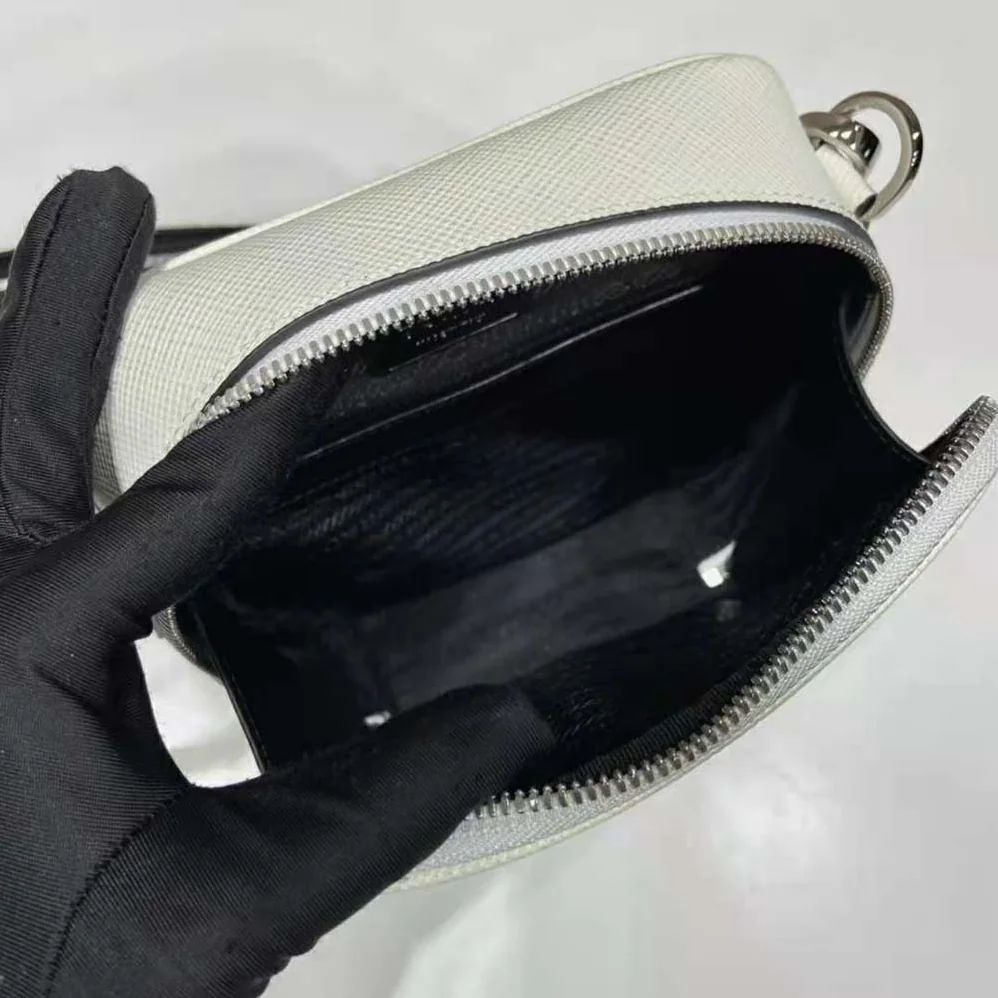 Prada Saffiano Leather Shoulder Bag with Sleek for Men in White Prada Saffiano Leather Shoulder Bag with Sleek for Men in White