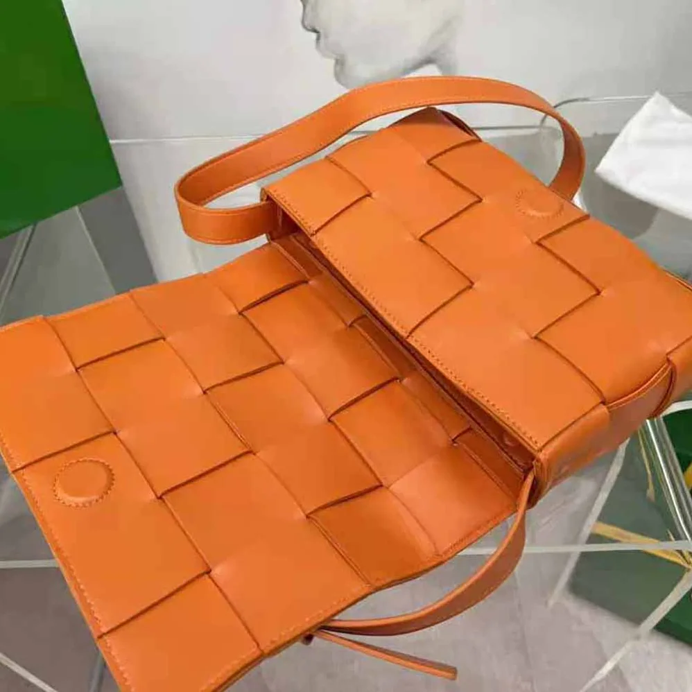Bottega Veneta Cassette Intreccio Leather Cross-Body Bag for Women in Orange Bottega Veneta Cassette Intreccio Leather Cross-Body Bag for Women in Orange
