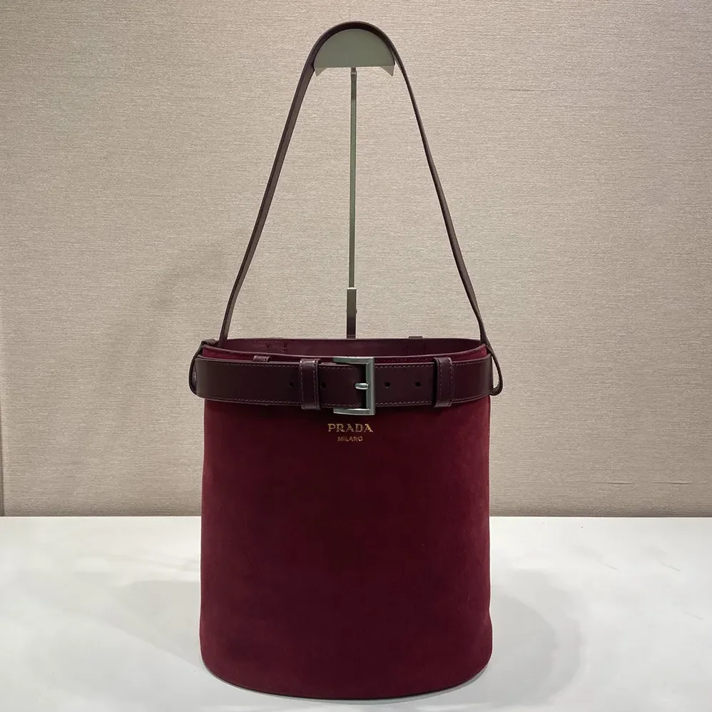 Prada Buckle Belted Suede Bucket Bag for Women in Burgundy Prada Buckle Belted Suede Bucket Bag for Women in Burgundy