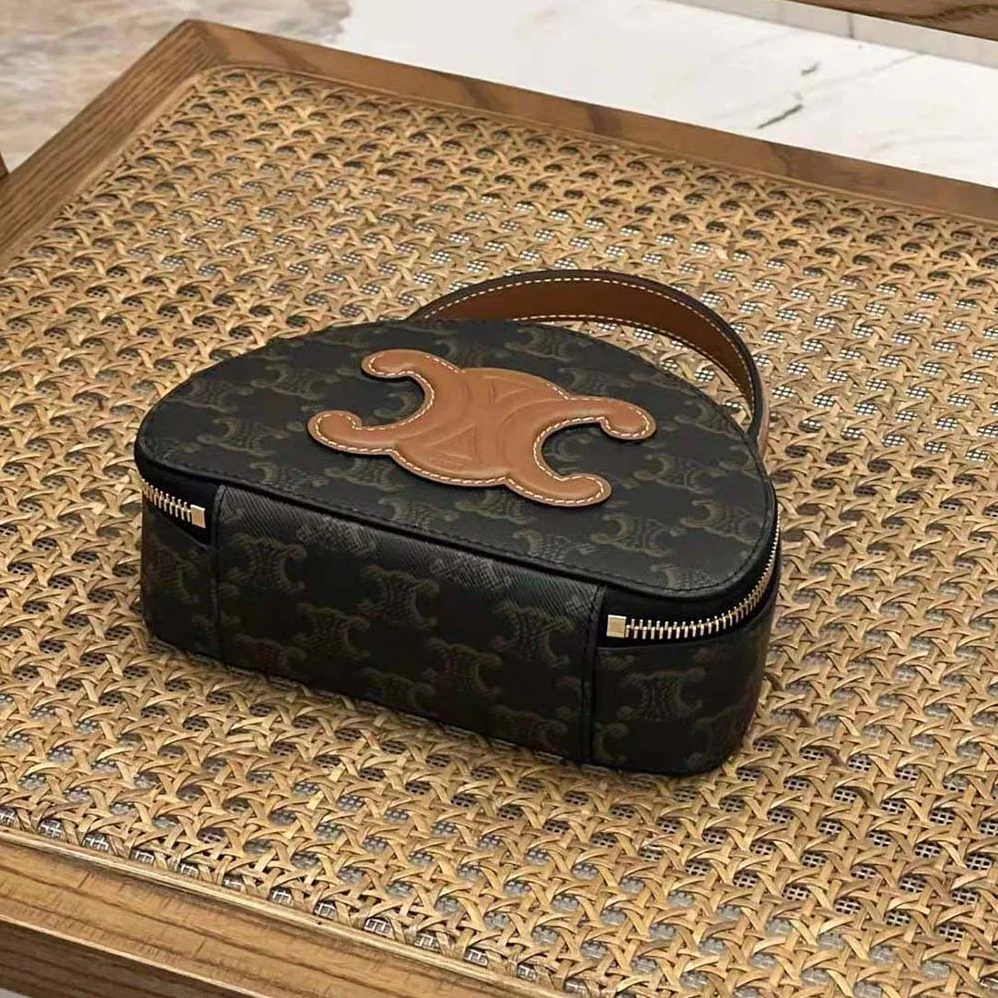 Celine Half Moon Case Cuir Triomphe in Triomphe Canvas and Calfskin for Women Celine Half Moon Case Cuir Triomphe in Triomphe Canvas and Calfskin for Women