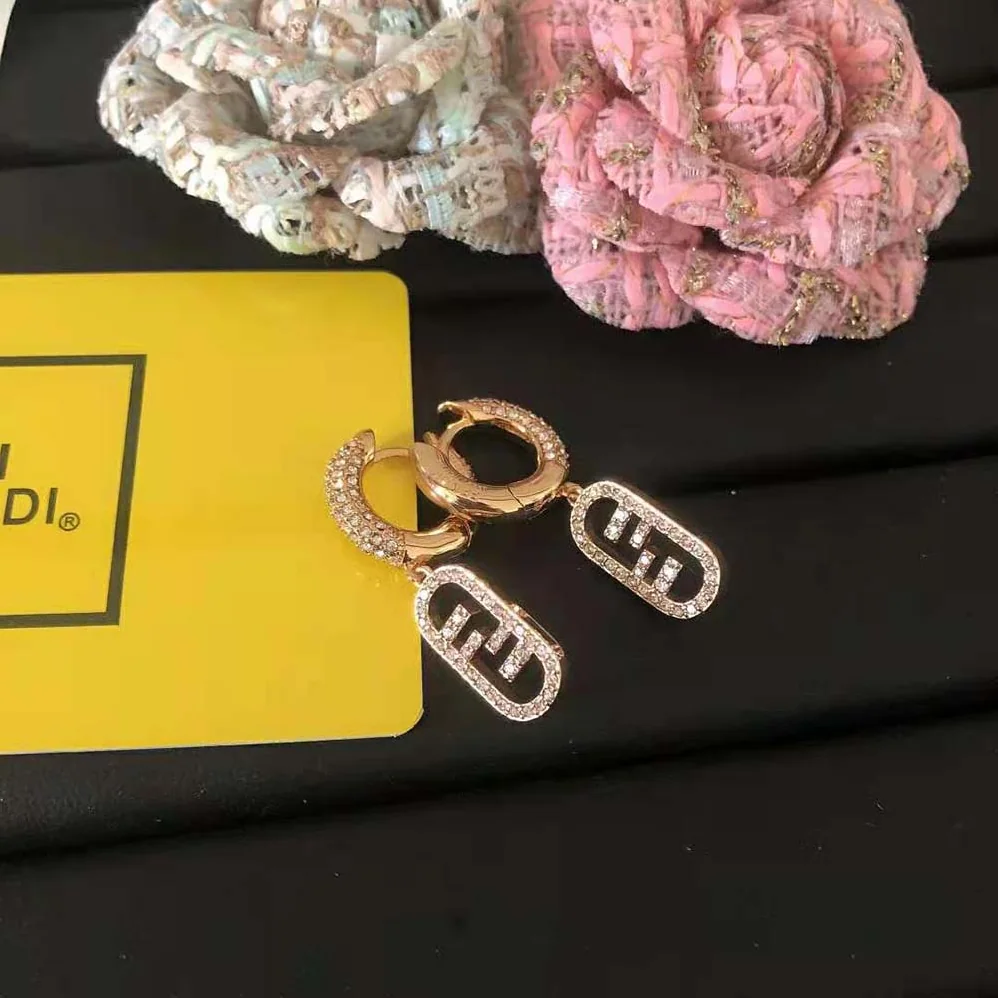 Fendi O Lock Earrings Gold-Colored Earrings in Bronze and Zircon for Women Fendi O Lock Earrings Gold-Colored Earrings in Bronze and Zircon for Women