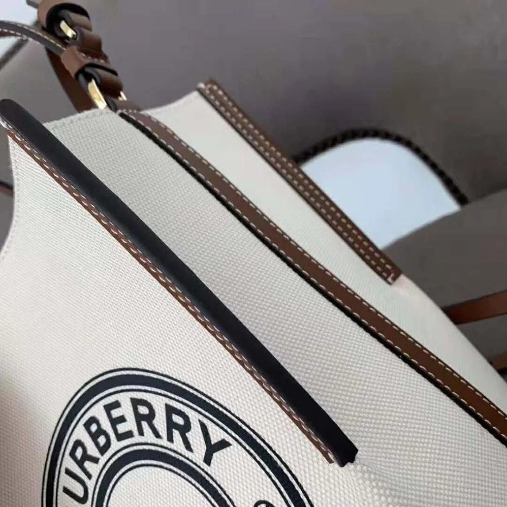 Burberry Small Logo Graphic Cotton Canvas Peggy Bucket Bag for Women Burberry Small Logo Graphic Cotton Canvas Peggy Bucket Bag for Women