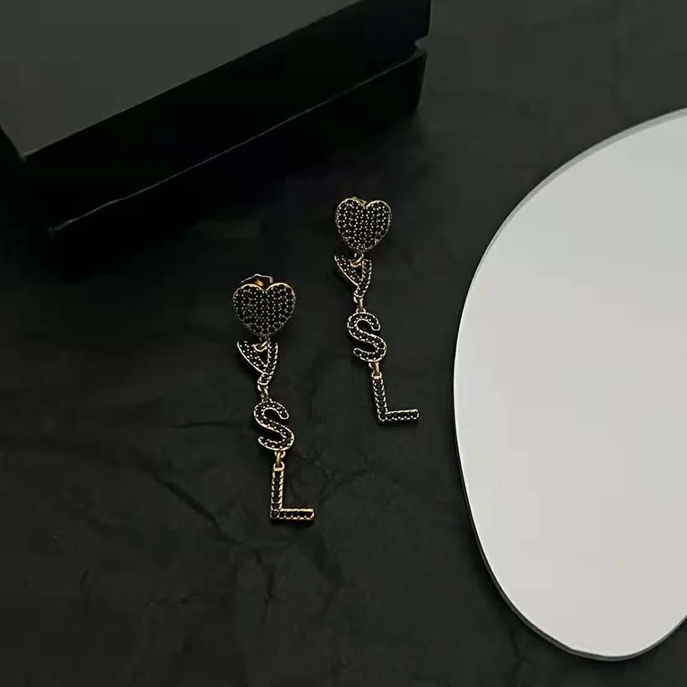 Saint Laurent YSL Opyum YSL Heart Earrings in Metal and Crystal for Women Saint Laurent YSL Opyum YSL Heart Earrings in Metal and Crystal for Women