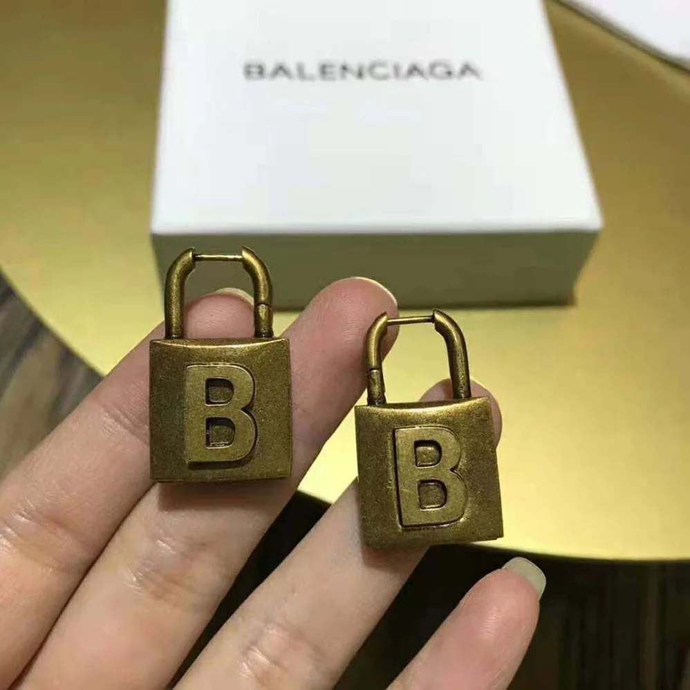 Balenciaga Lock Small Earrings in Aged for Women in Gold Brass Balenciaga Lock Small Earrings in Aged for Women in Gold Brass