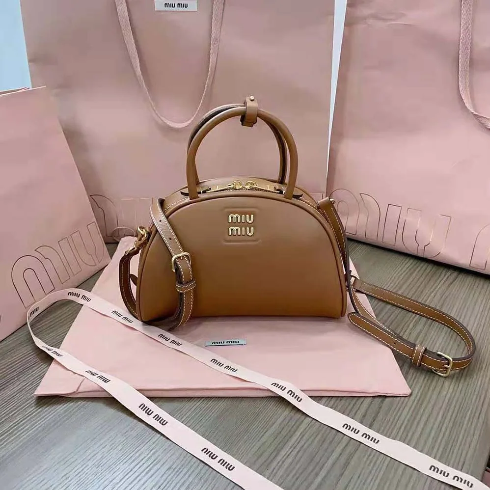 Miu Miu Medium Leather Top-handle Bag for Women in Brown