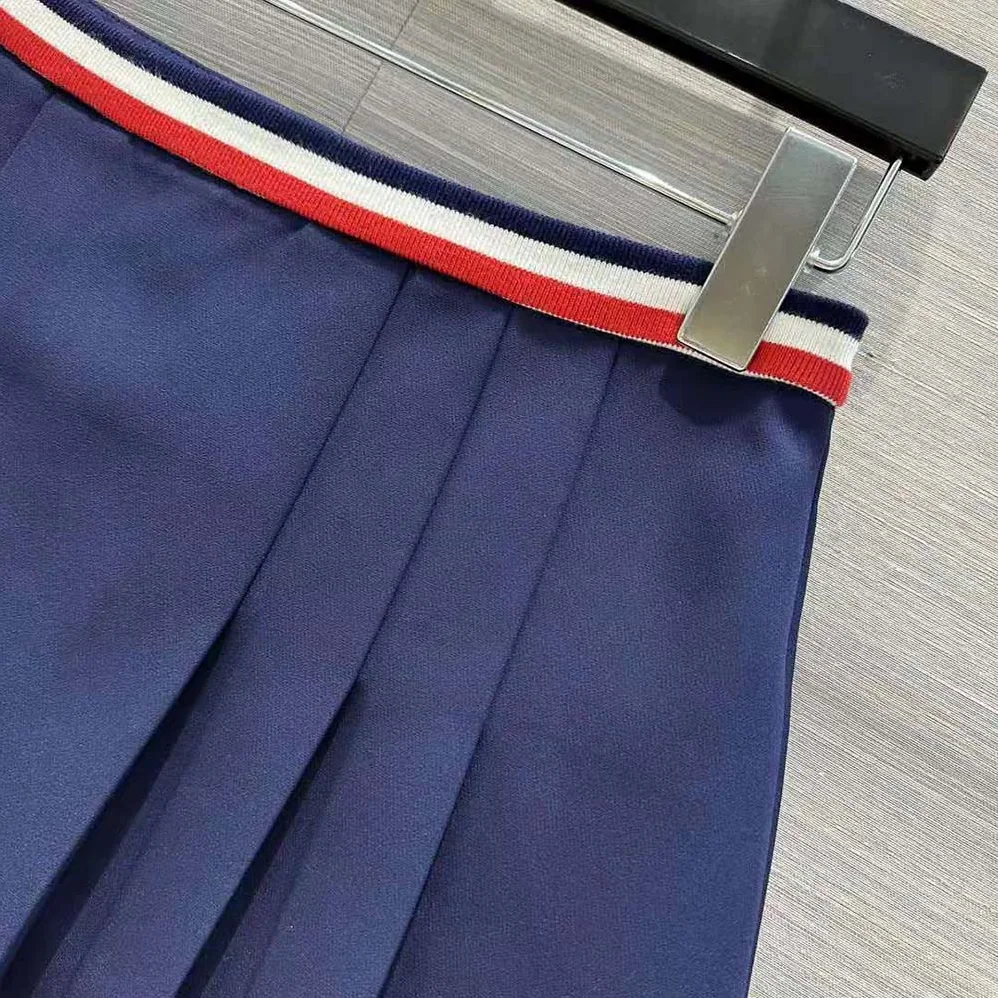 Celine Pleated Mini Skirt in Cotton Gabardine for Women in Navy Celine Pleated Mini Skirt in Cotton Gabardine for Women in Navy