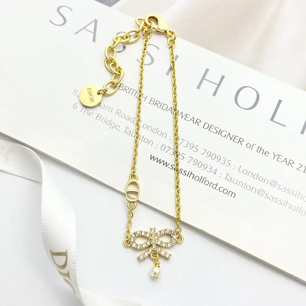 Dior Le Nœud de Dior Necklace Gold-Finish Metal with White Resin Pearl and Silver for Women in Tone Crystals Dior Le Nœud de Dior Necklace Gold-Finish Metal with White Resin Pearl and Silver for Women in Tone Crystals
