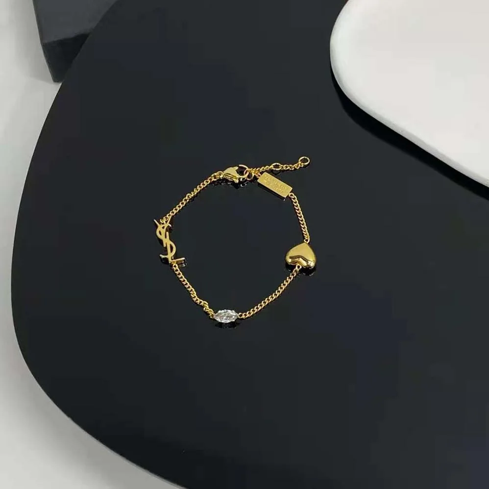 Saint Laurent YSL Opyum Heart Charm Bracelet in Metal for Women