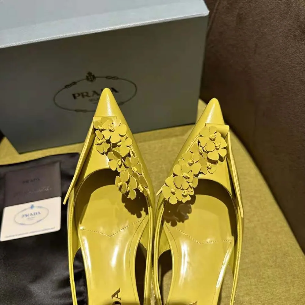 Prada Brushed Leather Slingback Pumps with Floral Appliques for Women in Yellow