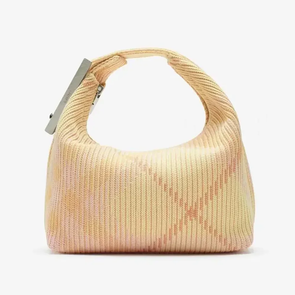 Burberry Mini Peg Duffle Bag for Women in Pink