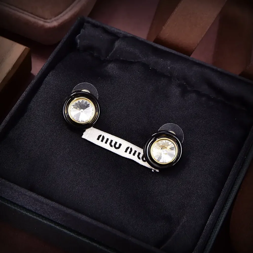Miu Miu Plexiglas and Metal Earrings for Women Miu Miu Plexiglas and Metal Earrings for Women