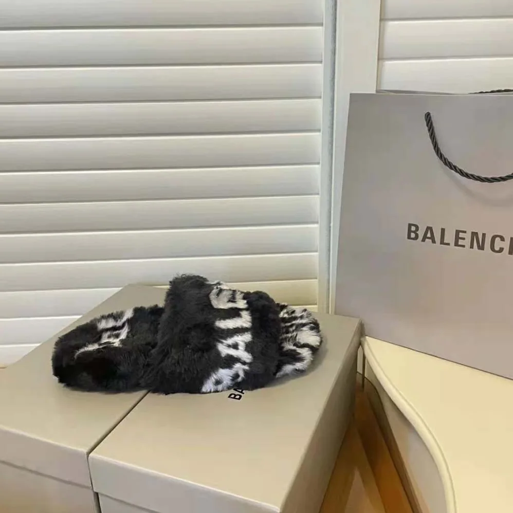 Balenciaga Furry Slide Sandal Allover Logo in Black and White Fake Fur for Women Balenciaga Furry Slide Sandal Allover Logo in Black and White Fake Fur for Women